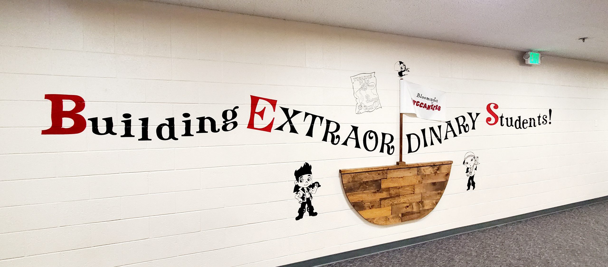 Building Extraordinary Students with boat on a wall